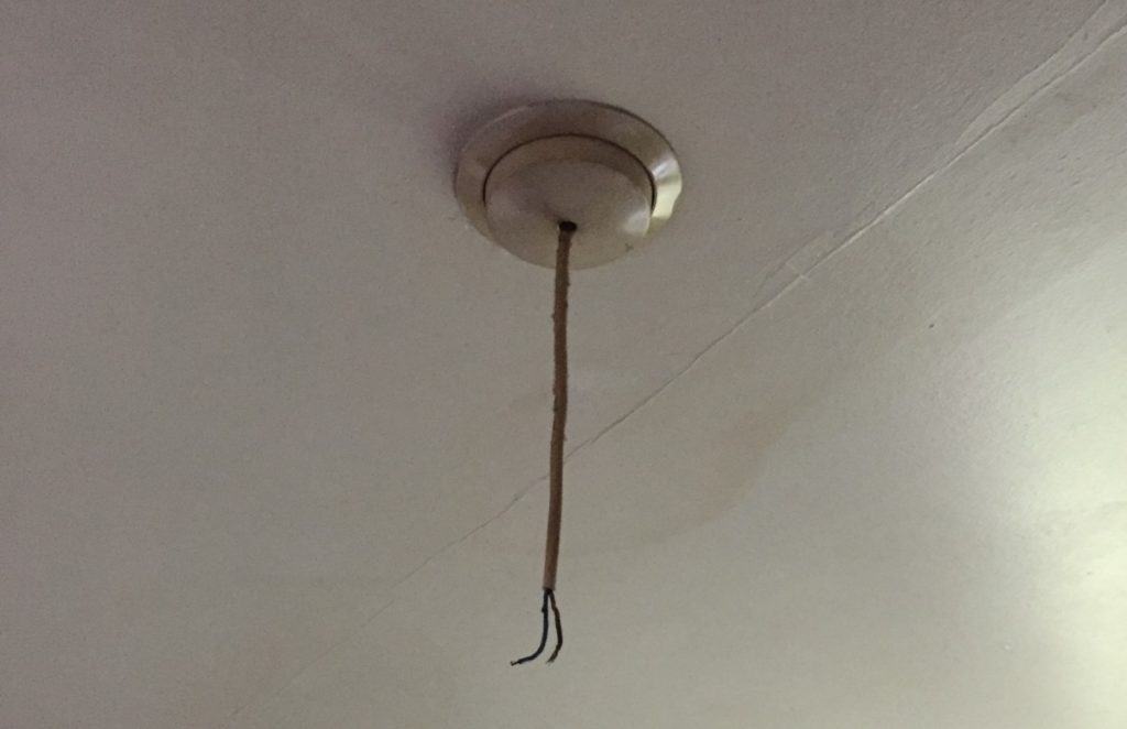 This is a light I came across at work, the ends dangling were Live. A very dangerous attempt at DIY electrical work.