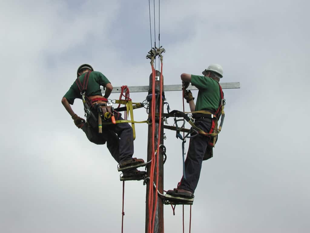 Well trained power linemen doing a dangerous job