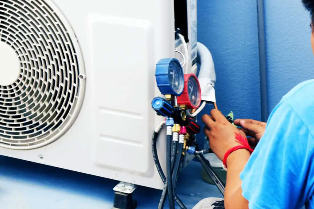 Electrician fixing air-con system