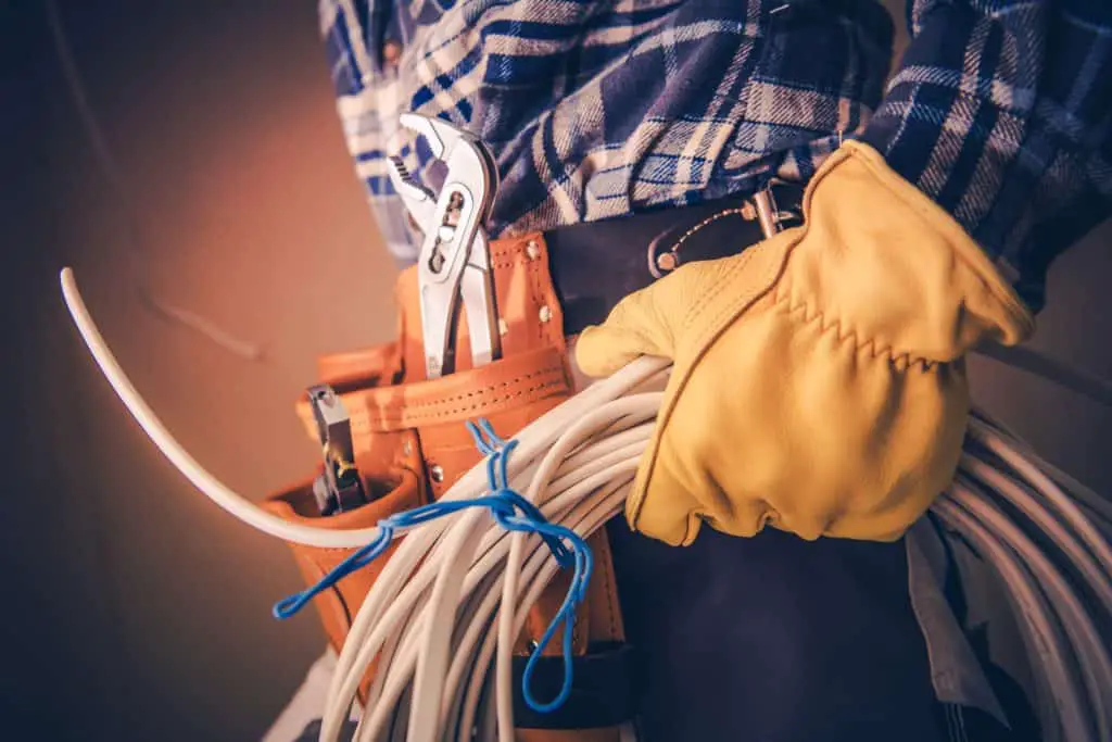 electrician holding cable